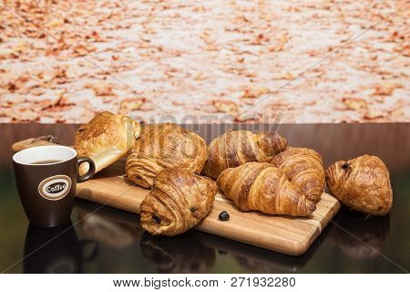An Buttercake With Raisins And Croissant Is Made Of Puff Pastry