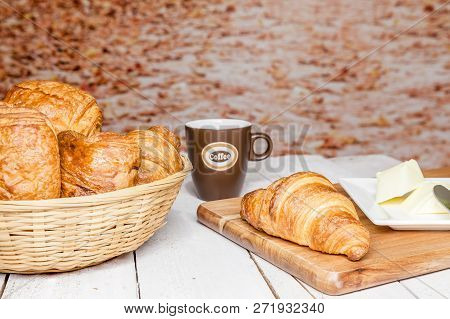An Buttercake With Raisins And Croissant Is Made Of Puff Pastry