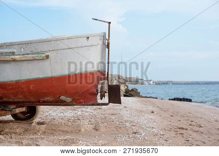Old Fishing Boats On A Sandy Beach.