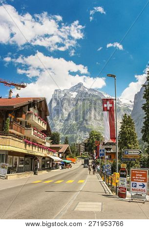 Grindelwald, Switzerland - July, 2013: Dorfstrasse Street In Grindelwald With Parts Of Mattenberg In