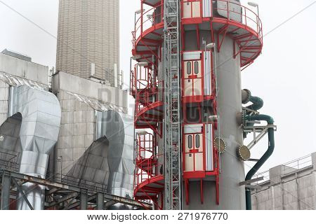 Old A New Chimneys At Heating Plant Covered In Fog, Cloudy Winter Day, Low Angle View, Energy Produc