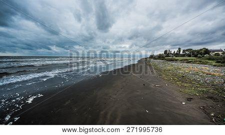 Rusty Bridge Stretching Into The Lifeless Sea, Caspian Sea Under Blue Sky In Early September, Snag O