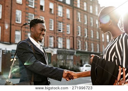 New business acquaintances shaking hands
