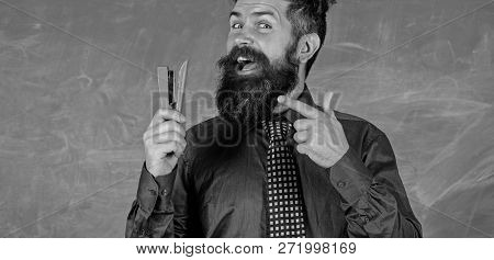 Teacher Bearded Man With Stapler Chalkboard Background. Prepare For School Season Buy Stationery. Ma