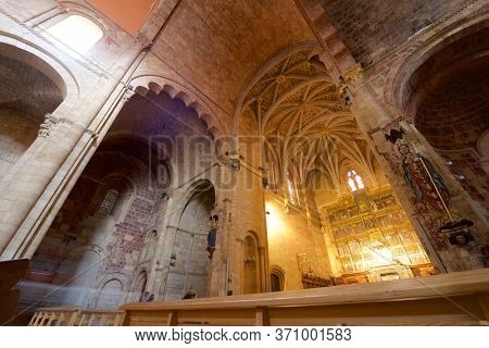 Leon, Spain - June 27, 2017: Parishioners praying in the basilica of san Isidoro.