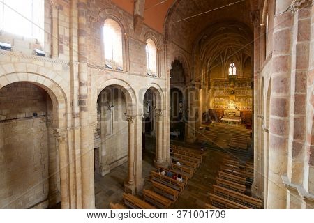 Leon, Spain - June 27, 2017: Parishioners praying in the basilica of san Isidoro.