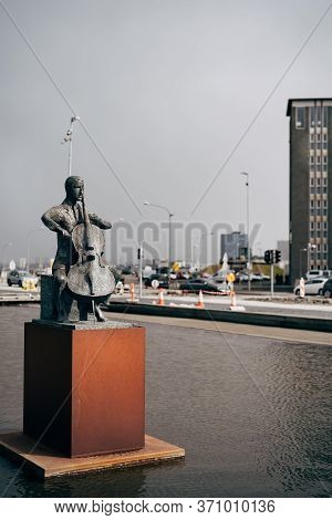 Reykjavik, Iceland - 02 May 2019: Statue Of Danish Cellist Erling Blondal Bengtsson Outside The Harp