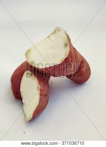 Broken Pink Color Sweet Potato Isolated In A White Background. This Is The Main Food In Pongal Or Ma