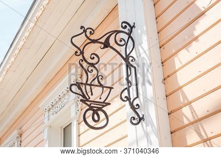 Kafe Forged Symbol, Cup Sign On The Rustic, Vintage Building. Tourism To Russia.