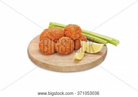 Raw Crispy Chicken Nuggets Breaded In Ground Chili Pepper And Bread Crumbs On A Wooden Board With Ce