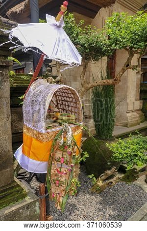 Altar Woven From Bamboo Wicker, Covered With White Cloth With Gold Pattern. Offerings To The Gods St