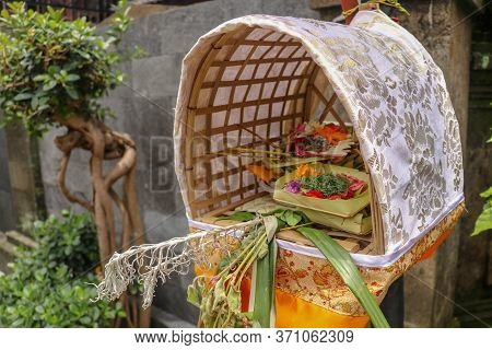 Altar Woven From Bamboo Wicker, Covered With White Cloth With Gold Pattern. Offerings To The Gods St