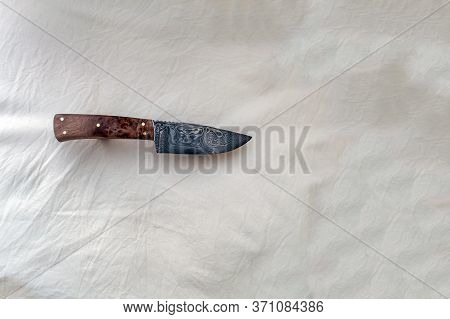 A Beautiful Wavy Pattern Is Seen In This Damascus Fixed Blade Knife Which Also Sports A Beautiful Br