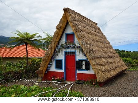 Santana, Madeira, Portugal - June 25, 2019: Traditional Madeira Building With Thatched Roof.
