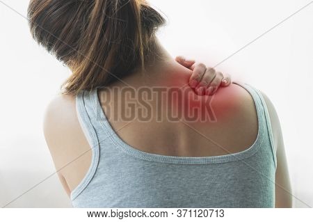 Person Touching Lower Back Feeling Muscle Pain At The Back.