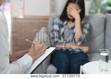 Psychologist Talking With Depressed Patient About Mental Condition.