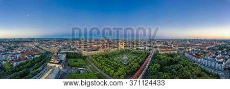 Beautiful Aerial View Over The Bavarian Metropole City Munich With The Alps Mouintains In The Backgr