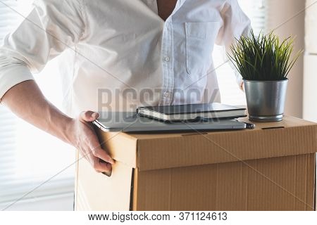 Downsize Business. Employee Moving Off From Office After Sacked From Company.