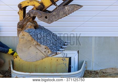 Moving Gravel Scoop Building Materials Window Well For Basement Construction New Residential Home
