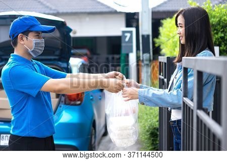 Asian Delivery Man Delivering Food, Fruit, Joice And Vegetable To Customer Home - Online Grocery Sho
