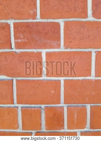 red brick wall background of new bricks