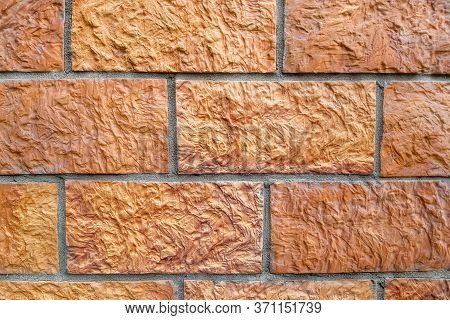 red brick wall background of new and old bricks