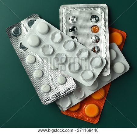 Heath, Healthcare Costs, Drugs, Medicines And Pills. Multiple Pill Blisters Piled On Top Of Each Oth
