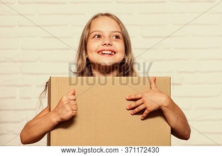 Rent House. Real Estate. Make Moving Easier. Girl Small Child Carry Cardboard Box. Packaging Things.