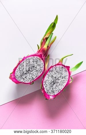 Creative Flat Layout With Dragonfruit Pitaya Or Pitahaya On Two Tone Double Color Paper, White And P