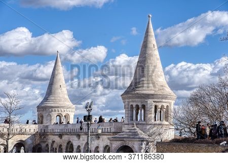 Budapest, Hungary - Feb 11, 2020: Cumulostratus Clouds Over Fishermans Bastion In Sunny Winter Morni