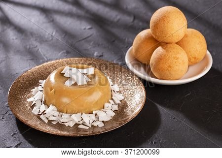 Traditional Colombian Bunuelos (deep Fried Cheese Bread) And Natilla