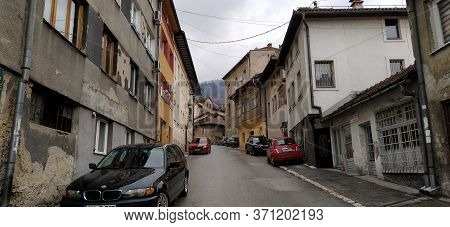 Sarajevo, Bosnia- March 8, 2020: Tourists Are Visiting Sebilj, Sarajevo Streets, Old Buildings, Tran