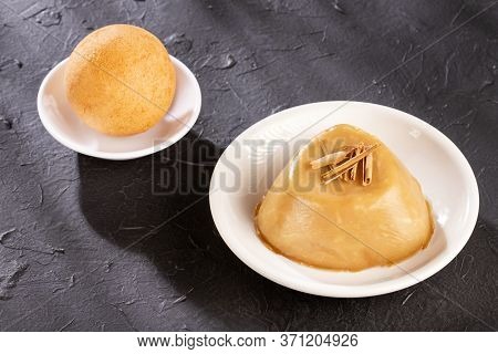 Traditional Colombian Bunuelos (deep Fried Cheese Bread) And Natilla