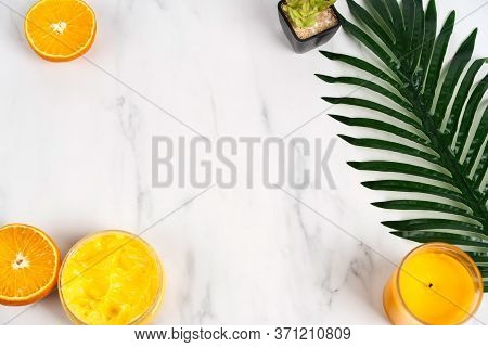 Body Cream Orange On The Background Of The Marble