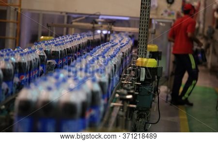 Camacari, Bahia / Brazil - March 22, 2017: Employee Is Seen At Ambev Brewery Production Line At Cama