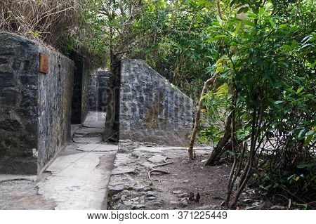 Cat Ba, Vietnam - March 9, 2016: Cannon Fort Open Air War Museum- Stone Corridor In Jungle