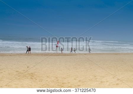 Da Nang, Vietnam - March 15, 2016: City Beach Few People Walking