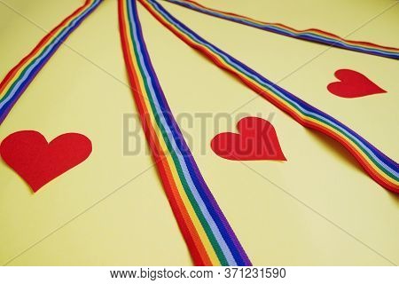 Red Paper Hearts With Rainbow Ribbon On A Yellow Background. Thanks To The Medical Staff For Their W