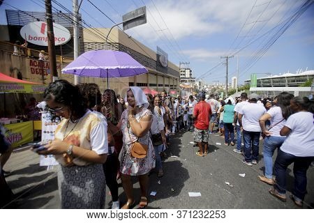 Salvador, Bahia / Brazil - October13, 2019: Devotees Arrive At Fonte Nova Arena In Salvador, For Mas