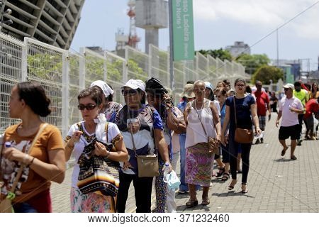 Salvador, Bahia / Brazil - October13, 2019: Devotees Arrive At Fonte Nova Arena In Salvador, For Mas