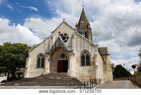 Saint Maclou Catholic Church Located In Conflans Sainte Honorine City, Parisian Region.