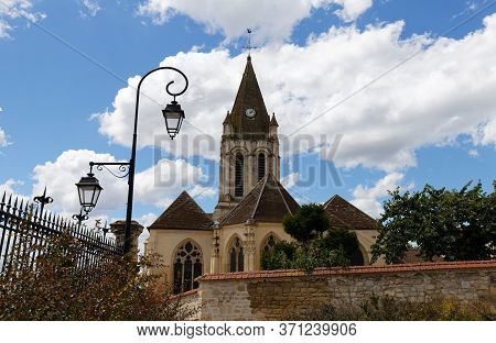 Saint Maclou Catholic Church Located In Conflans Sainte Honorine City, Parisian Region.