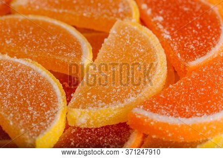 Macro Photo Multi-colored Marmalade Jelly Candys. Dessert Marmalade In The Form Of Lemon And Orange 