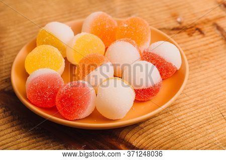 Macro Photo Multi-colored Marmalade Jelly Candys. Dessert Marmalade In The Form Of Lemon And Orange 