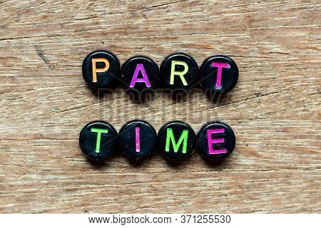 Black Bead With Color Letter In Word Part Time On Wood Background