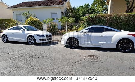 Bordeaux , Aquitaine / France - 06 10 2020 : Peugeot Rcz And Audi Tt Coupe White Design In Face To F
