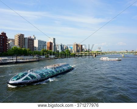 Tokyo / Japan - May 05, 2019: Landscape Of Sumida River With Tokyo Cruise Ship Hotaluna. Sunny Day