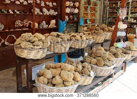 Symi, Greece - June 14, 2020: Sponge Shops In Symi Town, Symi Island, Greece