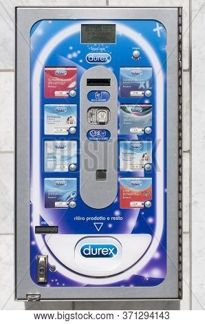 Carrara, Italy - June 14, 2020 - A Durex Condom Machine Outside A Pharmacy In Italy