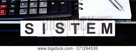 Business Concept Text On Wood Block Account With Calculator, Notebook And Laptor